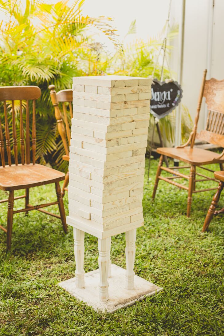 From the beginning, Roxy and Rodney's guests were encouraged to break loose and have fun. They started the day with a cocktail hour complete with a Jenga set and a few drinks so everyone could have good food and a drink before the nuptials. (The game also served as an alternative for guests who didn't want to dance later on.) "It was a hit and is now part of every home get-together," Roxy says.
