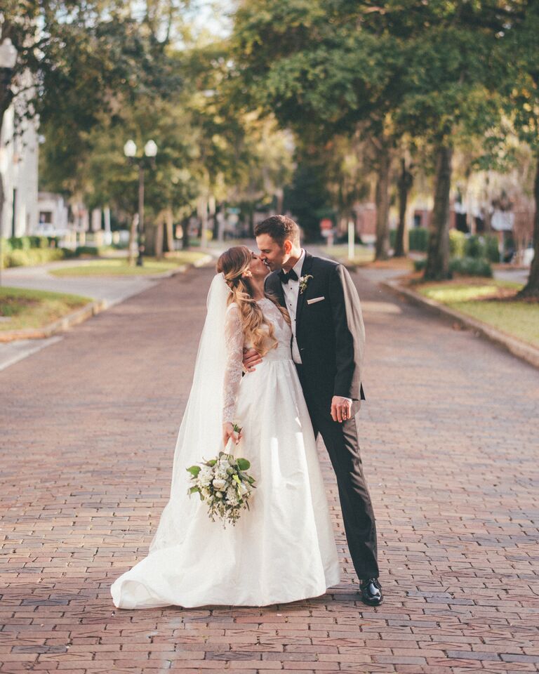 Theia A-line wedding dress with a matching cathedral-length veil 