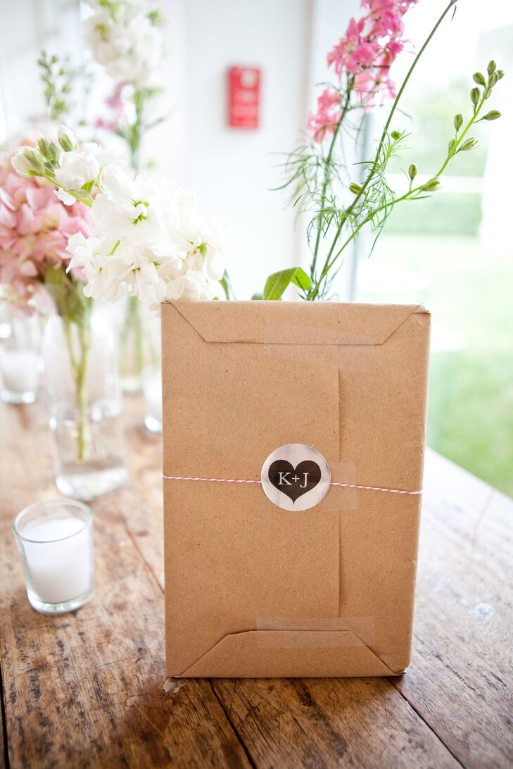 Kelley and Jeff chose a wedding favor that guests could continue to use in the years to come: a mini recipe book. Each was wrapped in brown paper and set in a neutral woven basket by the reception entrance at the Garrison in Garrison, New York.