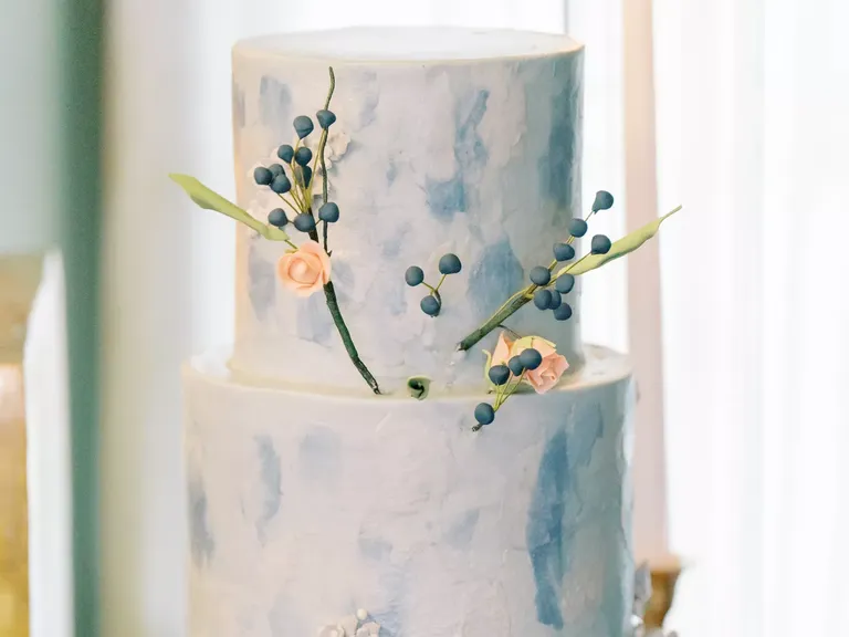 White and Blue Wedding Cake With Berries