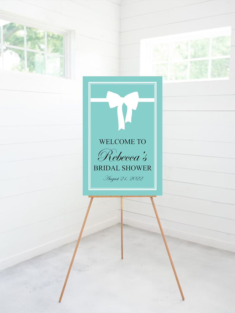 Tiffany blue sign with white bow and 'Welcome to... bridal shower' in black type