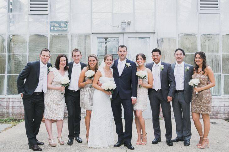 "Adam took a poll and found out all his groomsmen currently owned gray suits. We told them to wear those suits, and we provided them with ties and boutonnieres to bring the look together."
