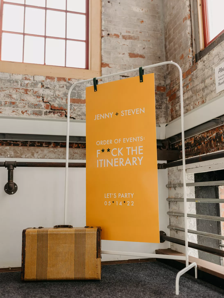 Unique wedding sign for a fun film-inspired reception