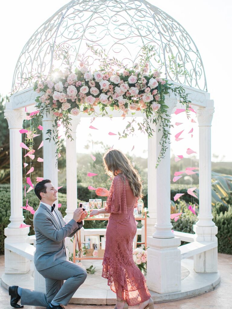 Man proposing to woman in at Waldorf Astoria Monarch beach