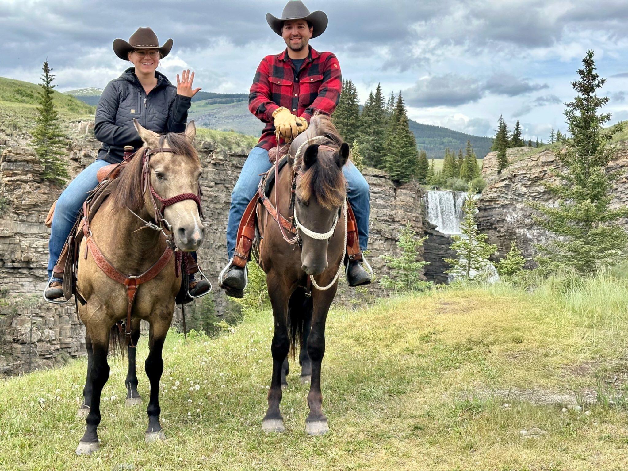 Tyler proposed during a quiet camping trip to Yaha Tinda, after a long trail ride through the mountains. At the base of Big Horn Falls, surrounded by nature and their horses, he asked, and Jane said yes.