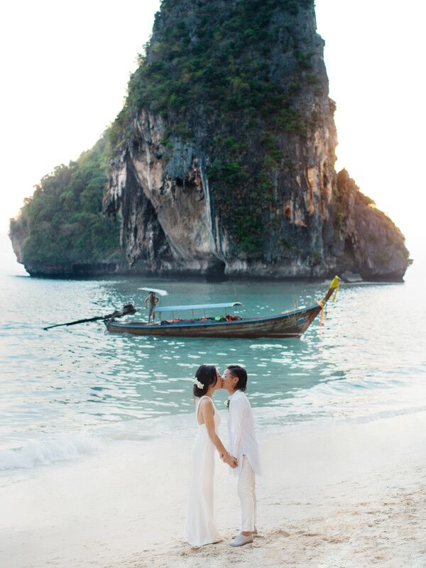 Couple kissing on the beach in Thailand