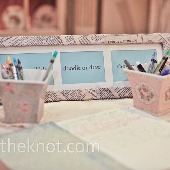 The couple let guests get creative with the sign-in book, instructing them to sign, scribble, doodle or draw with the crayons and markers provided.