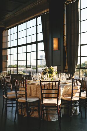 Round Table with Brown Wood Chiavari Chairs