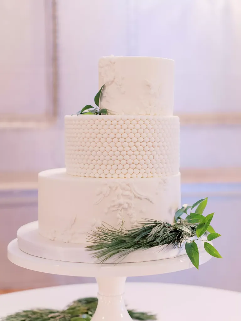 White Staircase Wedding Cake with Marble Accents