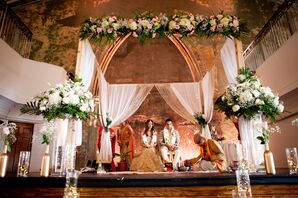 Mandap Draped with White Fabric and Flowers