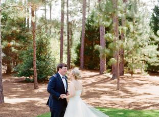 After postponing their wedding three times due to COVID-19, Sumner and James were finally able to celebrate their wedding amongst the pine trees of No
