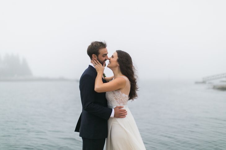 "My hair actually got ruined by the wind, fog and rain while we were taking photos after the ceremony," recalls Jenn. "Luckily my hair and makeup staff stayed for dinner and right before we were introduced  they whipped up a whimsical effortless braided up-do to fix my ruined hair! It looked like a planned hair change but was just a serendipitous event where my team helped me roll with the punches!"