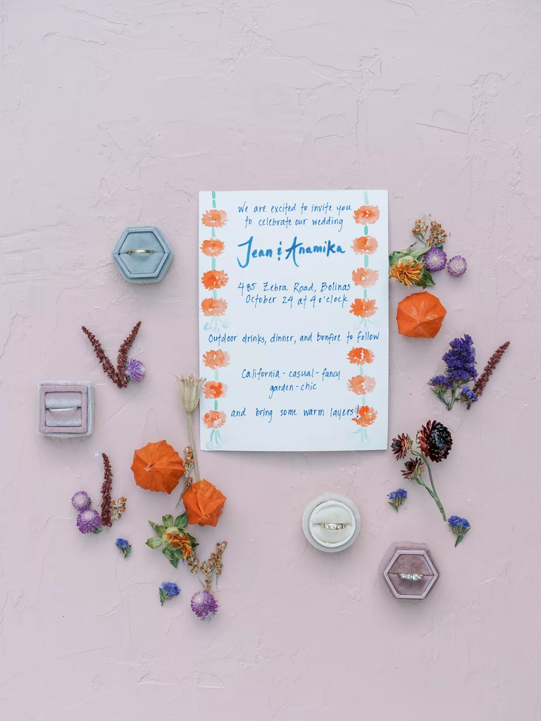 Purple and orange wedding invitation suite 