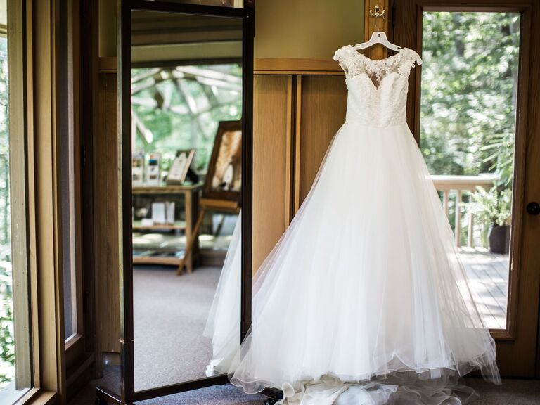 tulle ball gown on a hanger in dressing room