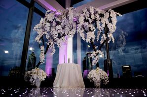 Elegant Wedding Arch Draped in White Orchids
