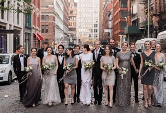 Bridesmaids and groomsmen wear mismatched semi-formal outfits. 