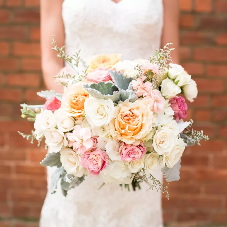 Gardenia and rose pastel wedding bouquet