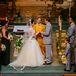 Inside the Cathedral of St. Joseph in Wheeling, West Virginia, Anna and Brandon were married in a traditional ceremony. Anna wore a gorgeous floor-length tulle veil trimmed with lace, attached to her elegant updo hairstyle.