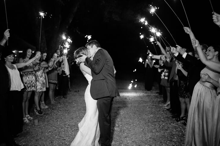 After dancing their first song to "Coming Home" by Leon Bridges, performed by a band, Allie Beth and Timothy ended the night with a stunning sparkler exit and began their new life in a Rolls-Royce.