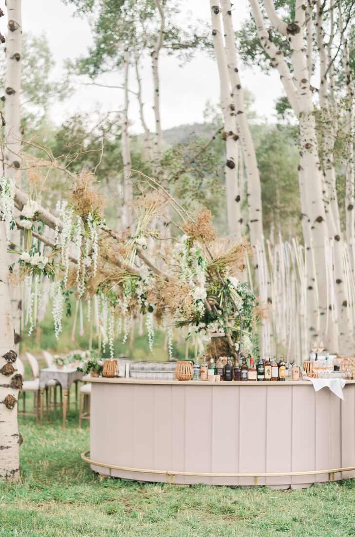 Custom Wood Bar with Dramatic Branch Arrangement