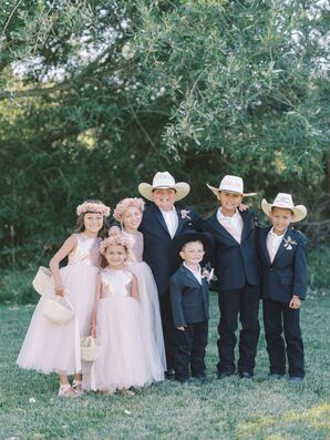 Ring Bearers With Cowboy Hats and Flower Girls in Tulle Dresses