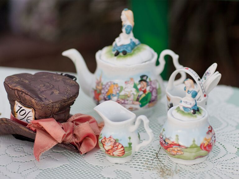 "Alice in Wonderland"-themed centerpiece at fairytale wedding