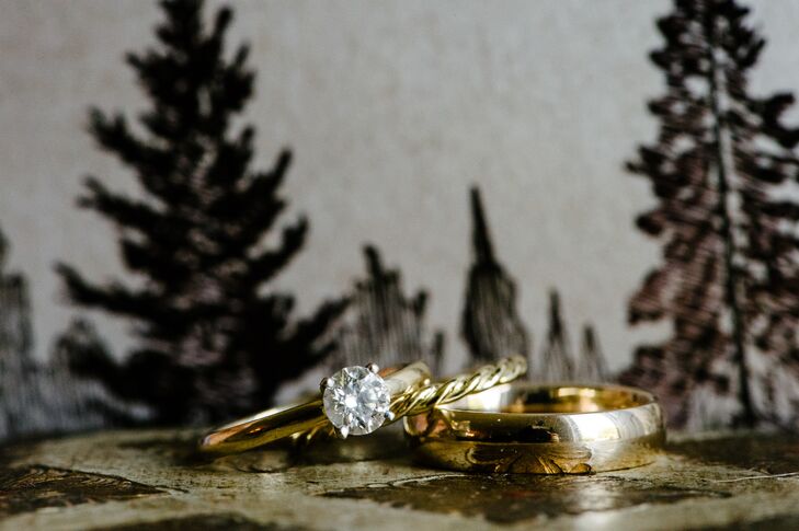 During the ceremony, Meredith and Justin exchanged classic gold wedding bands. Justin's was a traditional, polished yellow gold band, while Meredith's was a dainty twisted style, also in yellow gold.