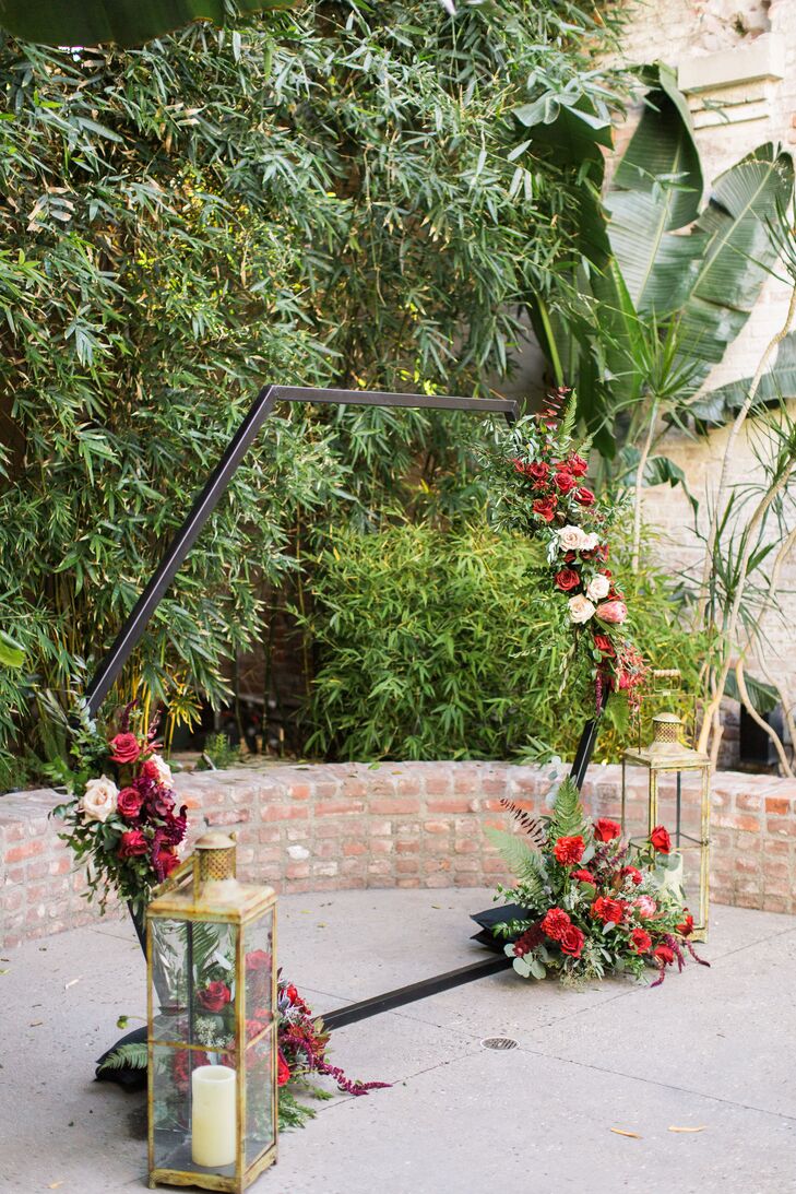 Modern Hexagon Wedding Arch with Red Flowers