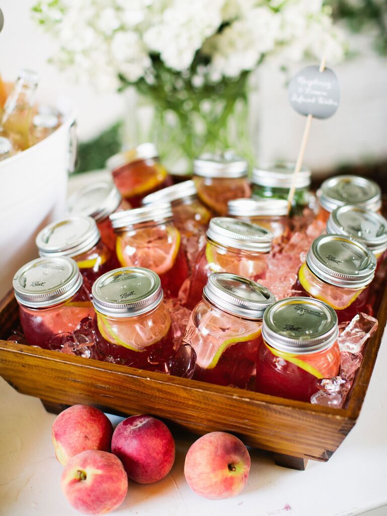peach tea cocktails in mason jars with lids