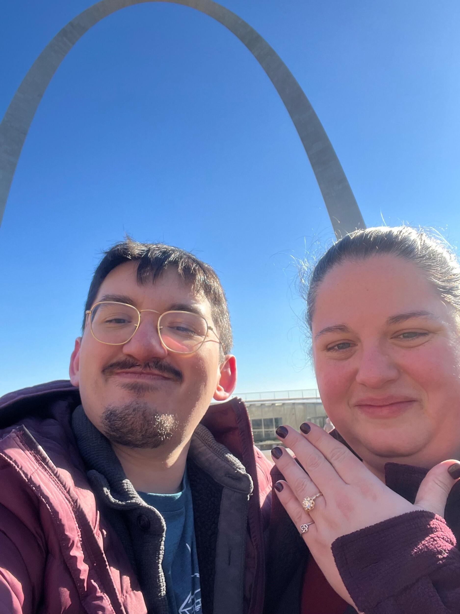 Ricky proposes under the Gateway Arch in St. Louis on Day 2 of our Madison to Houston road trip for Christmas 2024!  We celebrate in true Grindle Rodriguez style by going to a dog bar and showering Brewer with love and cuddles!   