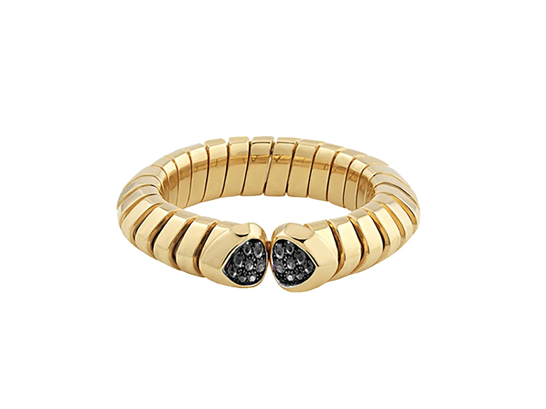 This one-of-a-kind gold engagement ring is sure to bring the wow factor with its central settings of two black diamonds.