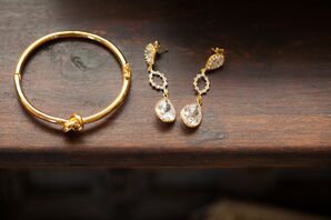 Gold Bracelet and Dangling Earrings