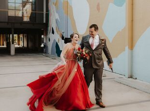 For their modern and industrial wedding, Caryn Gepp and Ryan Gepp mixed primary colors and fun patterns for a welcoming atmosphere. Guests received in