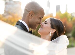 Sydney and Todd, who first met at a wedding themselves, tied the knot with an intimate, family-only wedding at the Cancer Survivors' Garden in Chicago