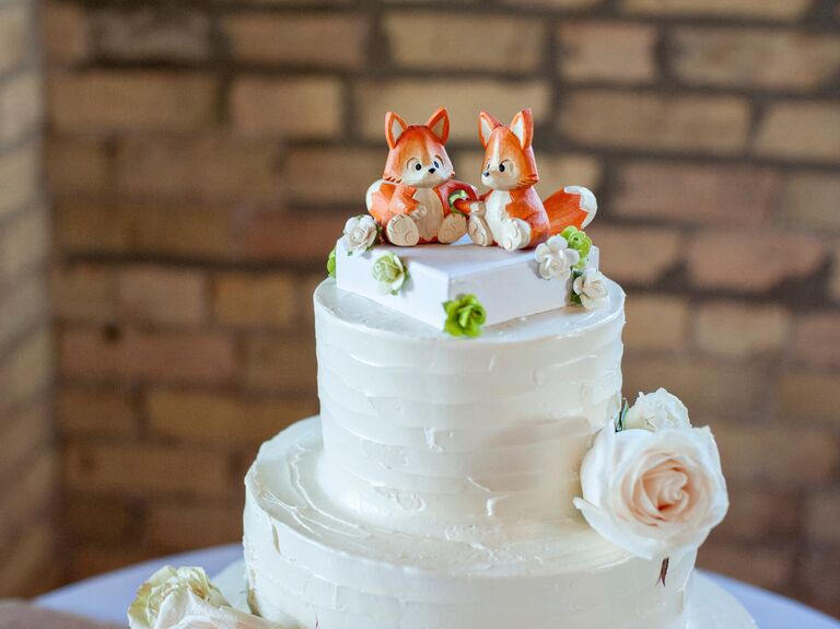 Wooden carved orange fox animal wedding cake toppers. 