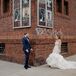 Modern Couple with Navy Suit and Mermaid Wedding Dress
