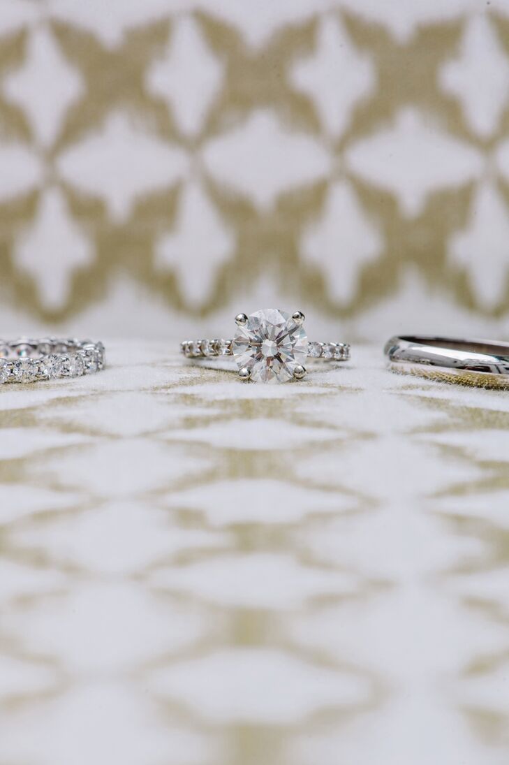 Before Jake popped the question, Blakeney hinted that she wanted a round solitaire diamond with a diamond band, which Jake had custom-made for her. For his wedding band, Jake chose a simple white gold band.