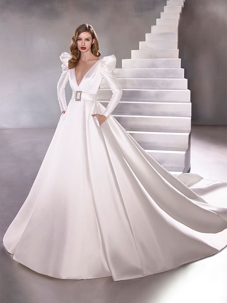 Atelier Provonias wedding dress belted ball gown with strong shoulders
