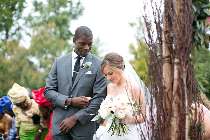 Jessica carried peach garden roses, ivory spray roses, white astilbe and seeded eucalyptus in her stunning bouquet. She loved that the lush florals were classic and boho with the neutral colors and textured look.