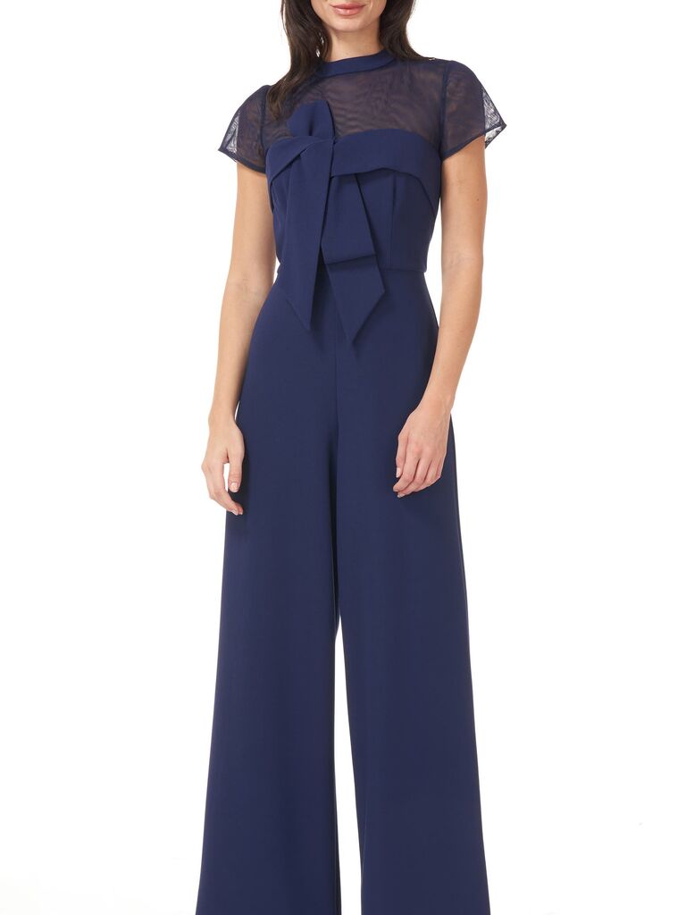 Model wearing a stretch crepe jumpsuit in navy
