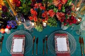 Place Settings With Clear Chargers and Teal Linens