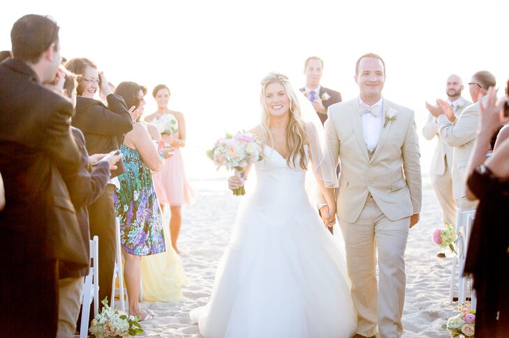 For the wedding, Ashlie opted for a custom-designed Matthew Christopher gown. The simple, yet elegant dress had a strapless, sweetheart neckline, light airy skirt and Basque waist.