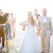 For the wedding, Ashlie opted for a custom-designed Matthew Christopher gown. The simple, yet elegant dress had a strapless, sweetheart neckline, light airy skirt and Basque waist.