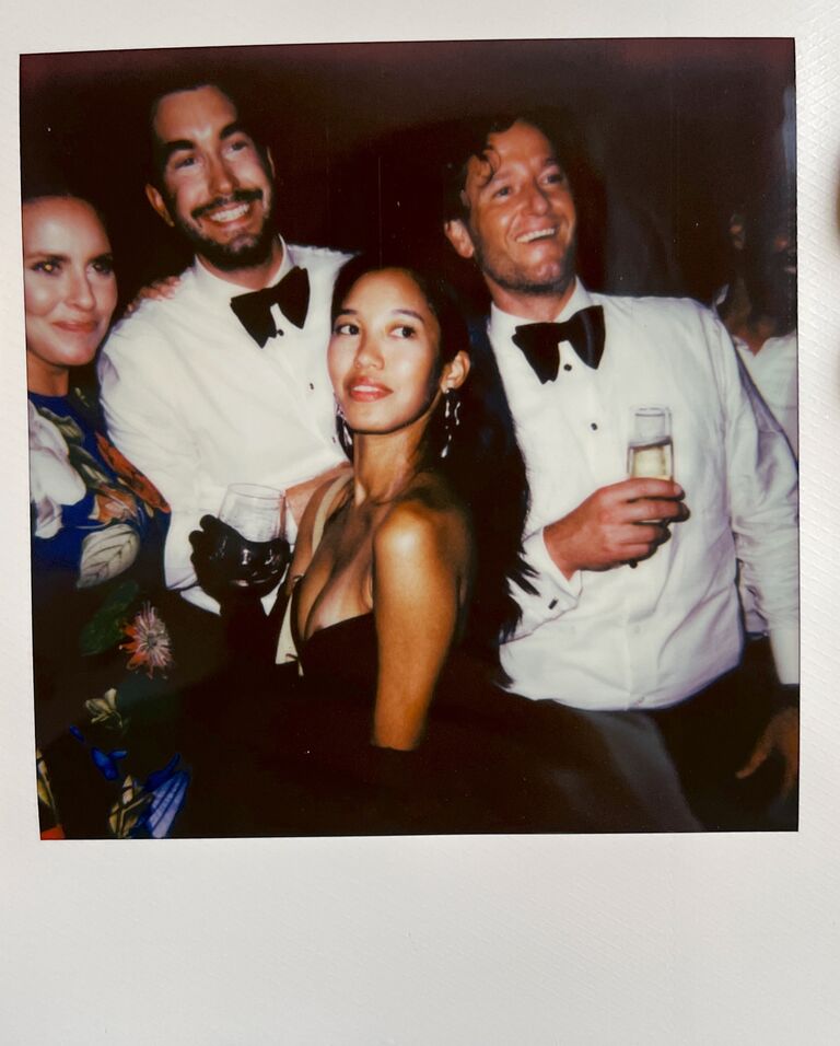 Polaroid of Michael Mendieta and Whitaker Irvin with wedding guests