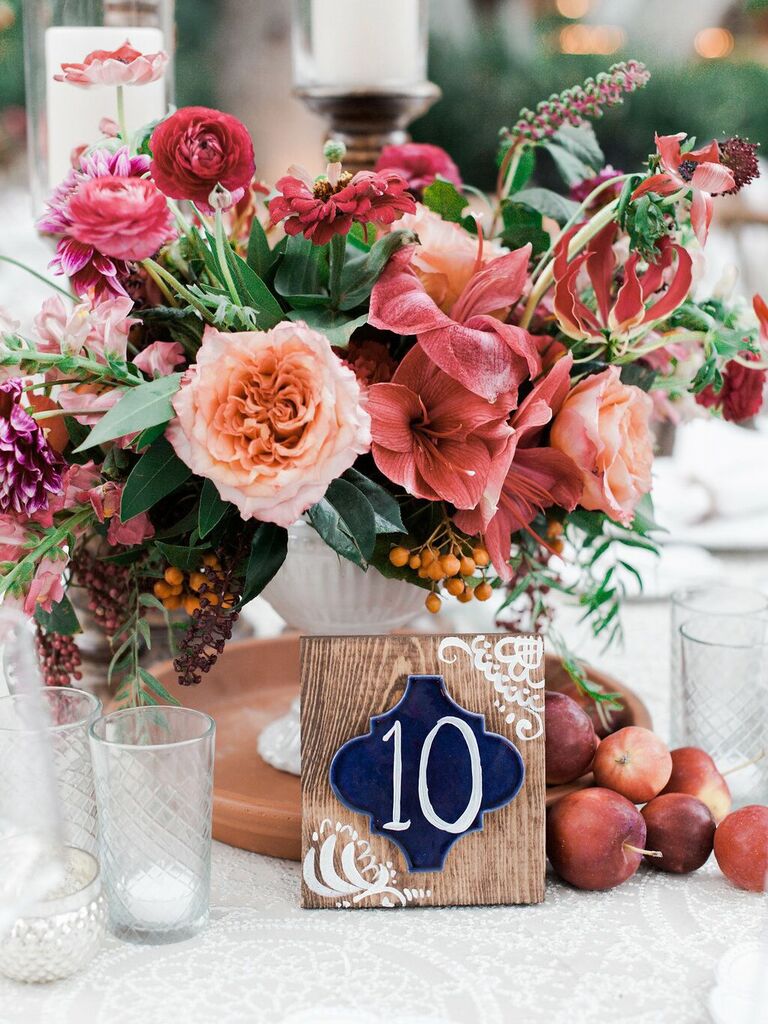 Red pink apples flower arrangements wedding centerpieces