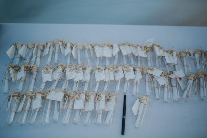 Guests left messages in tiny bottles for the couple.