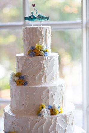 White Buttercream Wedding Cake with Kissing Fish Topper