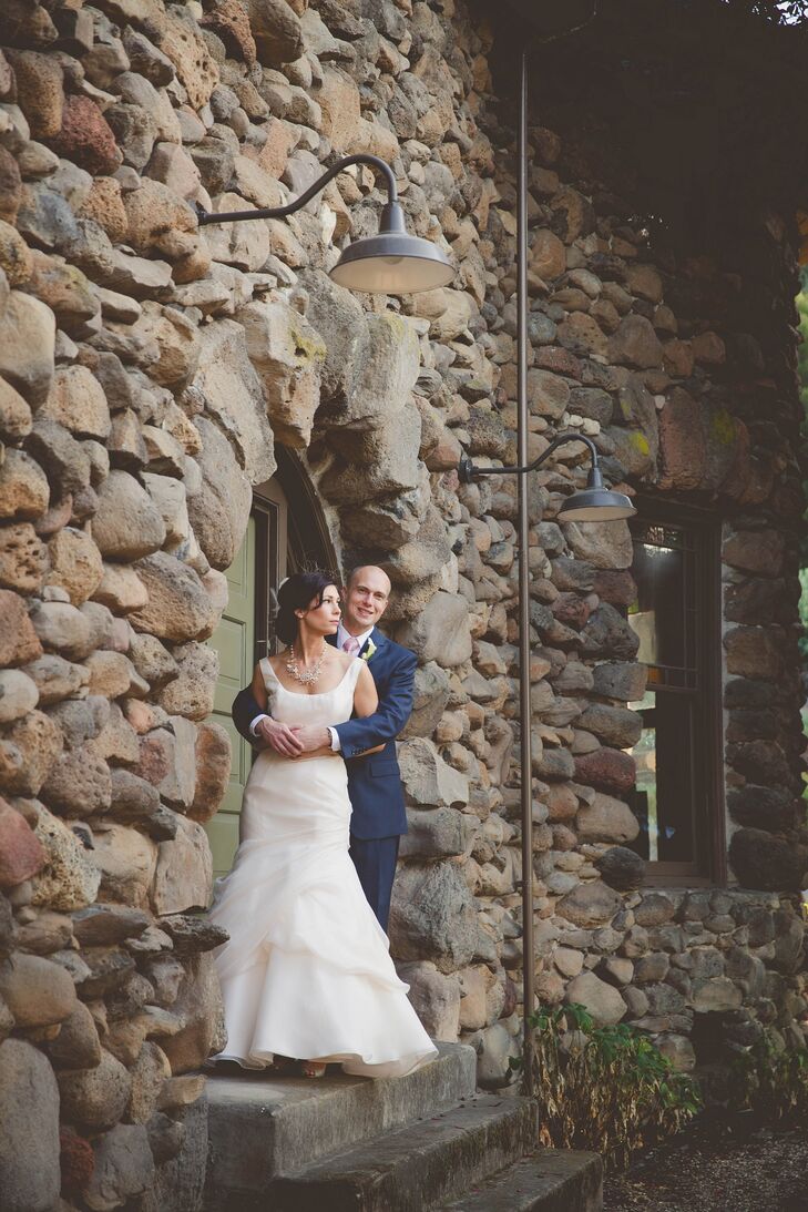 Holly wore a Monique Lhuillier Bliss gown in blush organza with a scoop neck and a tufted skirt.