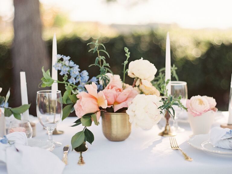 Brass glass floral wedding arrangements.