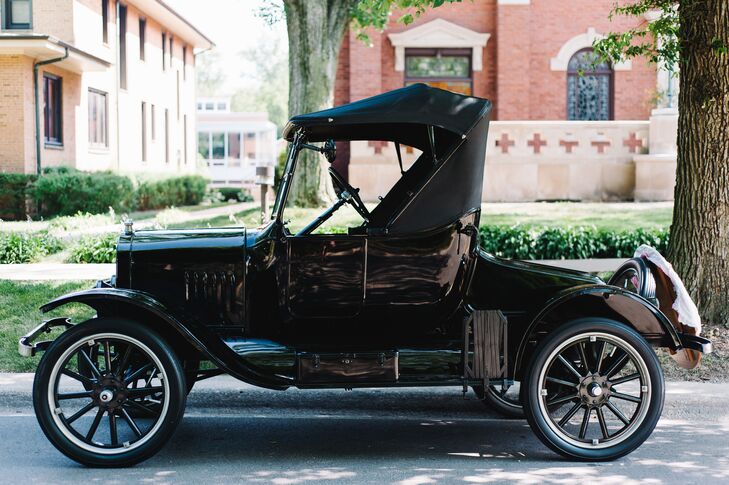 Guests cheered as the newlyweds drove off in a restored 1924 Model-T that the groom's father inherited. "After the ceremony, Matt drove us around our hometown and we shared some nice private time before the reception kicked off," Anna says.